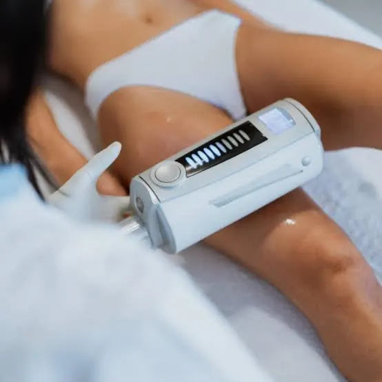 A compact handpiece worked along the lower leg